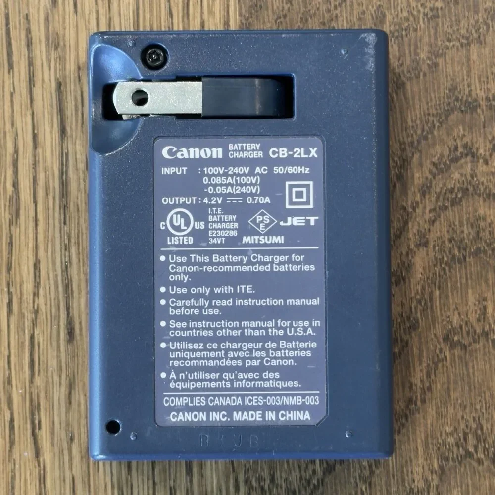 Canon PowerShot Digital ELPH SD890 IS 10MP Camera Manual Charger Open Box Tested